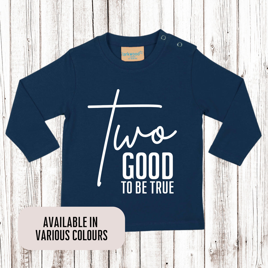 two good to be true t - shirt on a wooden background